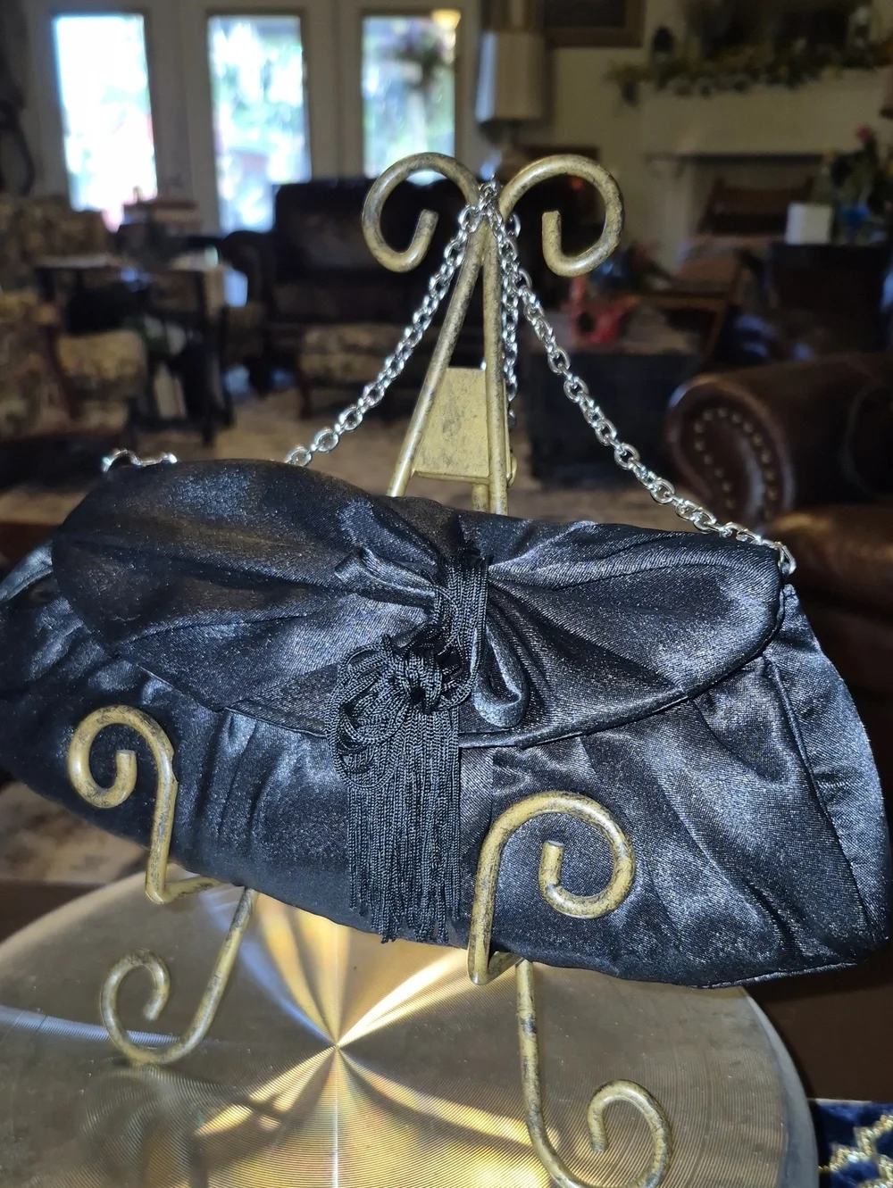 Vintage: A black satin foldover evening bag. Satin Bow& Rusch Pleating &tassels